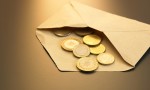 Umschlag mit Geld. (Foto: Shutterstock)